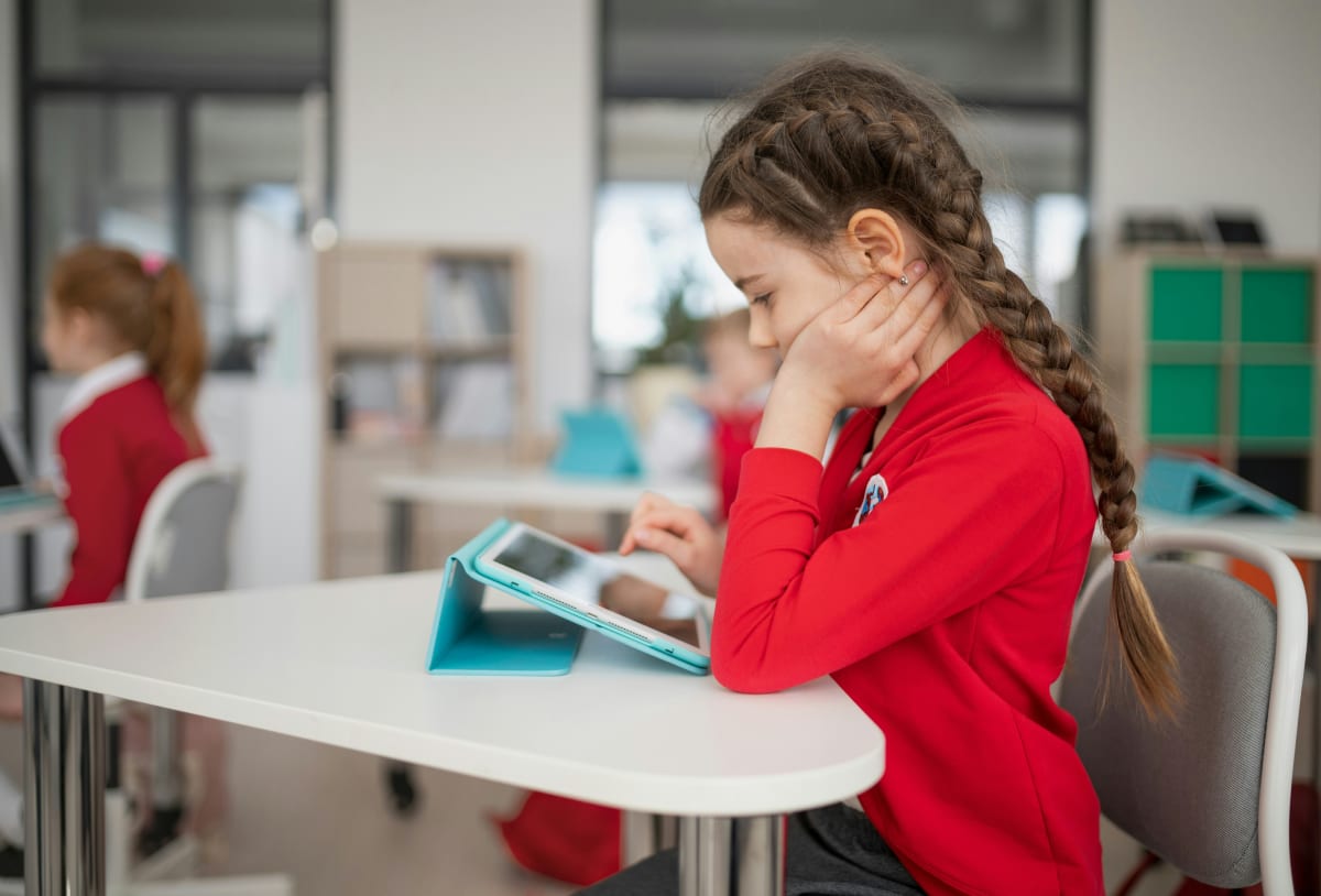 Student working on an Edzo quiz on an iPad