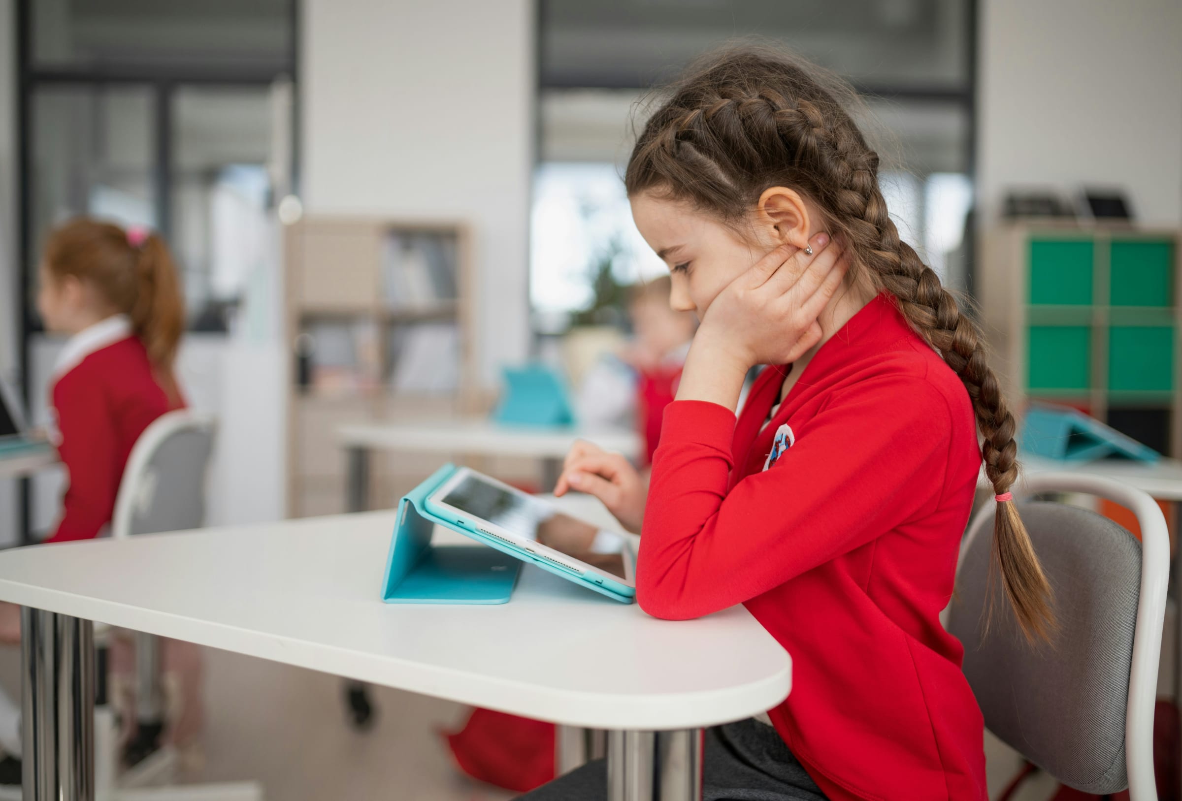 Student working on an Edzo quiz on an iPad